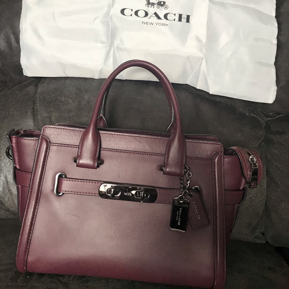 Brand new never used burgundy Coach satchel